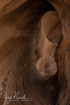 hole in the sandstone watermarked